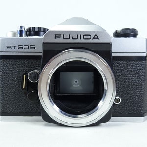 Fuji Fujica ST605 SLR 35mm Film Camera Body Only With Original Case.