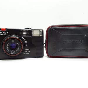 Pentax Pino 35 35mm Film Point and Shoot Analogue Camera with Case.