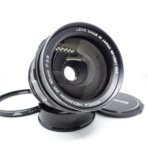 MINT - Konica Hexanon AR 35mm F2.8 Manual Focus Lens with Case, Filter And Both Caps
