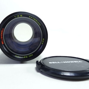 Bell&Howell f/2.8 135mm Telephoto lens In Good Condition.