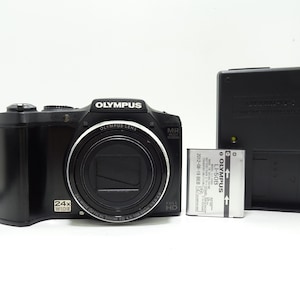 Olympus Stylus SZ-31MR 14.0MP Compact Digital Camera with Battery & Charger.