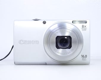Canon PowerShot A4000 IS HD Silver 16.0 MP Compact Digital Camera With Battery & Charger