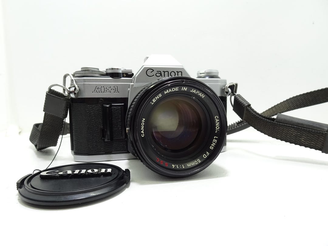 Canon AE-1 Program SLR Film Camera With FD 50mm F/1.4 S.S.C Lens