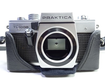 Appareil photo reflex Praktica Super TL1000 35 mm - Boîtier uniquement avec étui.
