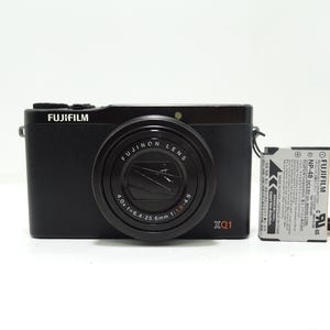 Fujifilm XQ1 12.0MP Black Compact Digital Camera with Battery Good Condition.