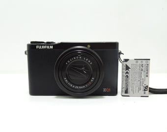 Cámara digital compacta Fujifilm XQ1 12,0 MP negra con batería, buen estado.