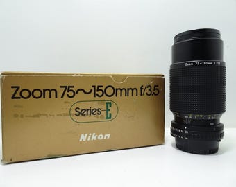 Objetivo zoom Nikon 75-150 mm f/3,5 serie E con caja.
