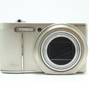 RICOH CX4 10MP Digital Compact Camera - Golden With Battery & Charger.