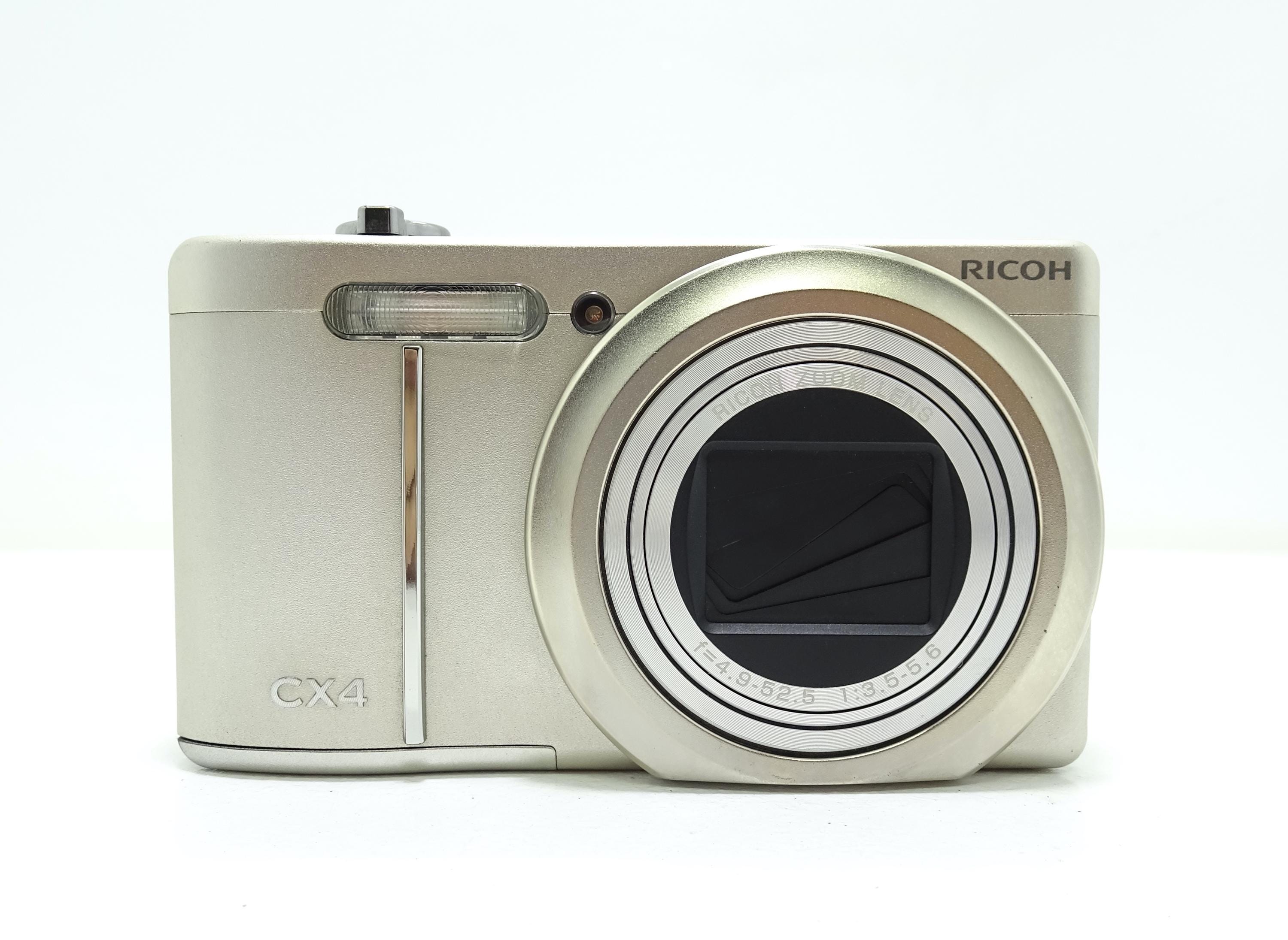 RICOH CX4 10MP Digital Compact Camera - Golden With Battery