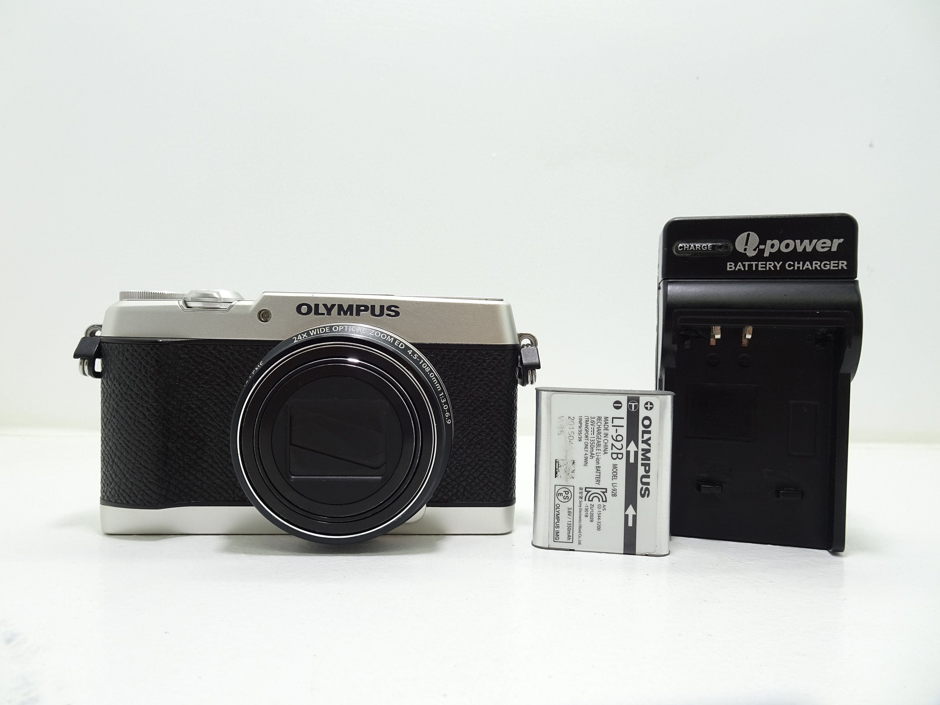 Olympus Stylus SH-2 16MP Point & Shoot digital camera - Silver with Battery and Charger.