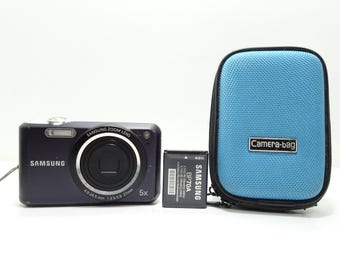 Cámara digital compacta Samsung ES71 de 12,2 MP con batería y estuche.