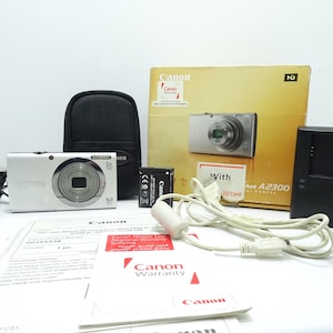 Canon Powershot A2300 Silver 16.0MP Digital Camera with Accessories.