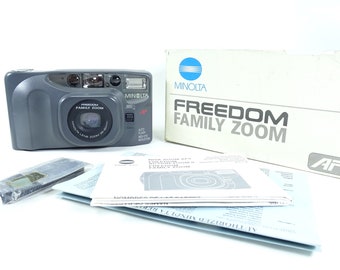 Minolta Freedom Family Zoom 35mm Film Point And Shoot Camera-Boxed + Manual In Good Condition.