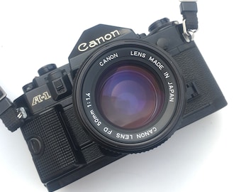 Cámara réflex de película Canon A-1 Vintage de 35 mm con lente Canon de 50 mm f1.4.