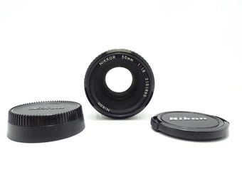 Nikon Nikkor 50mm f/1.8 Ai MF standard PRIME Lens with Both Caps.