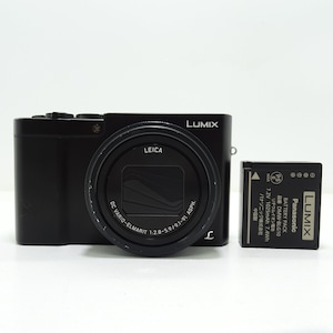 Panasonic Lumix DMC-TX1 Black Digital Compact Camera with Battery In Good Condition.