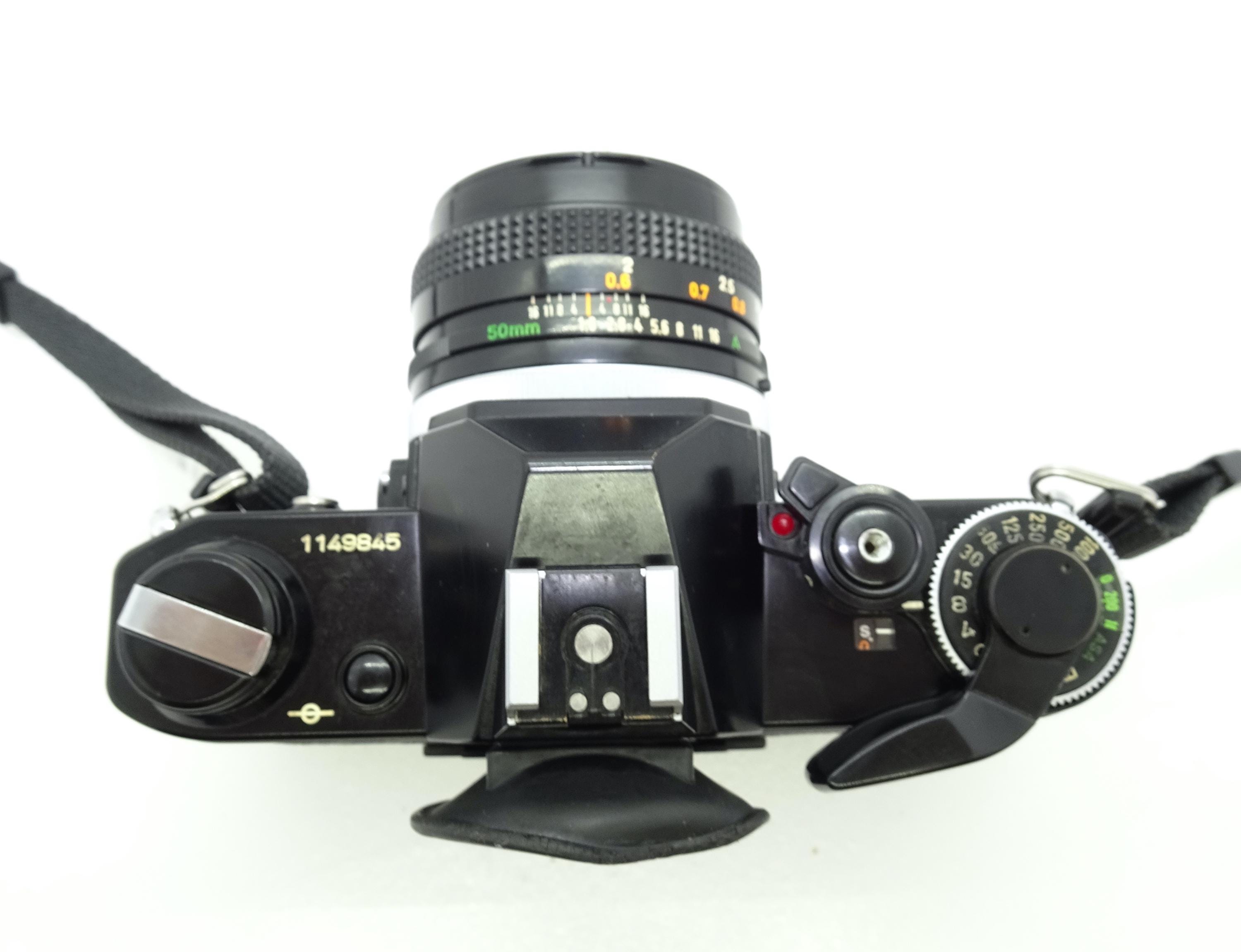 Canon AE-1 Black SLR Film Camera With Canon FD 50mm F/1.8 Lens - Etsy