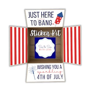 May include: A red, white, and blue striped box with the text "JUST HERE TO BANG Sticker Kit" on the front. The box is open and inside is a blue sticker with the text "Sea to Sea WITH LOVE". The bottom of the box has the text "WISHING YOU A sparkling 4TH OF JULY" with a red, white, and blue firework graphic.
