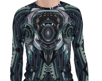 May include: A long-sleeved shirt with a blue, green, and black geometric pattern. The pattern resembles a robot or machine with a large central eye.