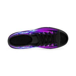May include: Black high-top sneakers with a purple and blue abstract design.