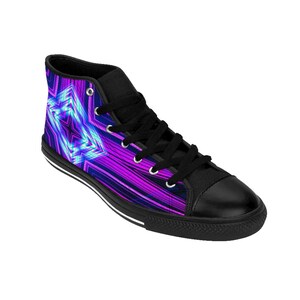 May include: High-top sneakers with a black canvas upper and a white rubber sole. The shoes feature a colorful design with a blue and purple geometric pattern.