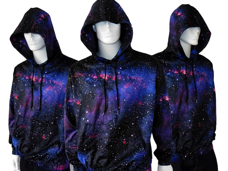 May include: Three black hooded sweatshirts with a galaxy print featuring shades of blue, purple, and pink. The print resembles a starry night sky.