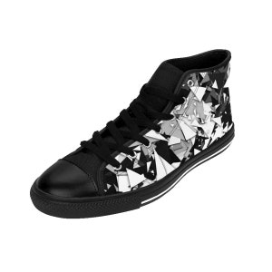 May include: Black high-top canvas sneakers with a white and gray geometric pattern.
