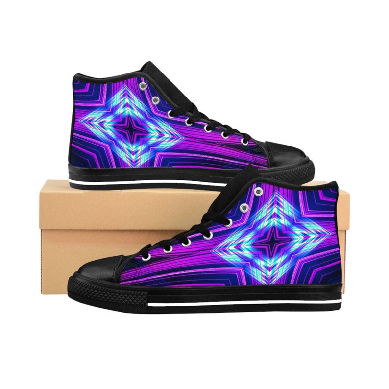 May include: A pair of high-top sneakers with a black canvas upper and a white sole. The sneakers feature a colorful geometric design with shades of purple, blue, and white.