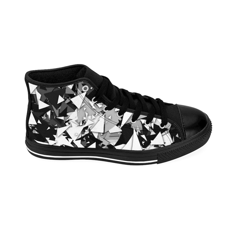 May include: Black high-top canvas sneakers with a white and gray geometric pattern.