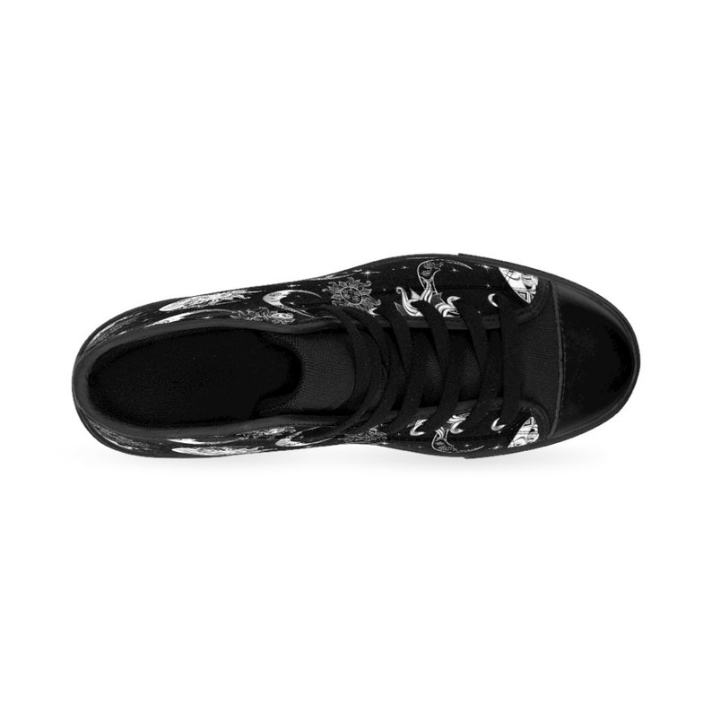 May include: Black high-top canvas sneakers with a white celestial print featuring moons, stars, and other celestial bodies.