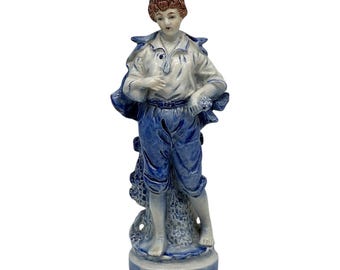Vintage Ceramic Boy Figurine  9” Tall  Unmarked  Hand Painted  Blue & White
