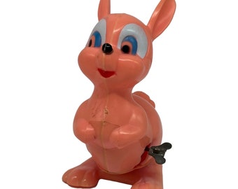 Vintage Easter Unlimited Wind Up Rabbit Toy Bunny  Blue Eyes  Plastic Spring