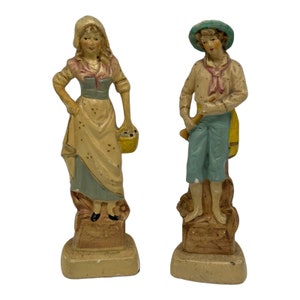 Vintage Chalkware Figurines Girl Holding Basket Boy Holding Horn  7.5” Tall