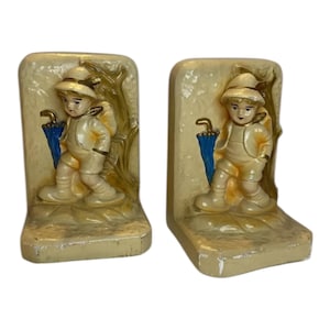 Vintage Chalkware Pair Of Bookends  Hummel Like Boy With Umbrella Very Cute!