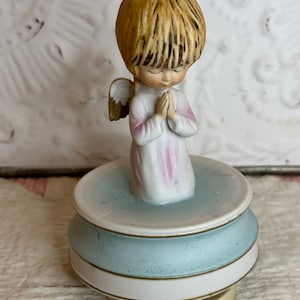 Caja de música giratoria con ángel de Navidad de 1974 de Fran Mar Moppets vintage Noche de paz