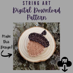 May include: String art pattern of an acorn on a wooden slice. The pattern is made with brown and tan string wrapped around nails. The image includes the text "STRING ART Digital Download Pattern Make this Design!"