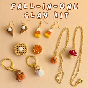 May include: A Fall-In-One Clay Kit featuring various jewellery components including pie slice earrings, candy corn earrings, a pumpkin pie charm, a cookie charm, a pumpkin necklace, a mushroom necklace, a bear keychain, and a dog keychain.