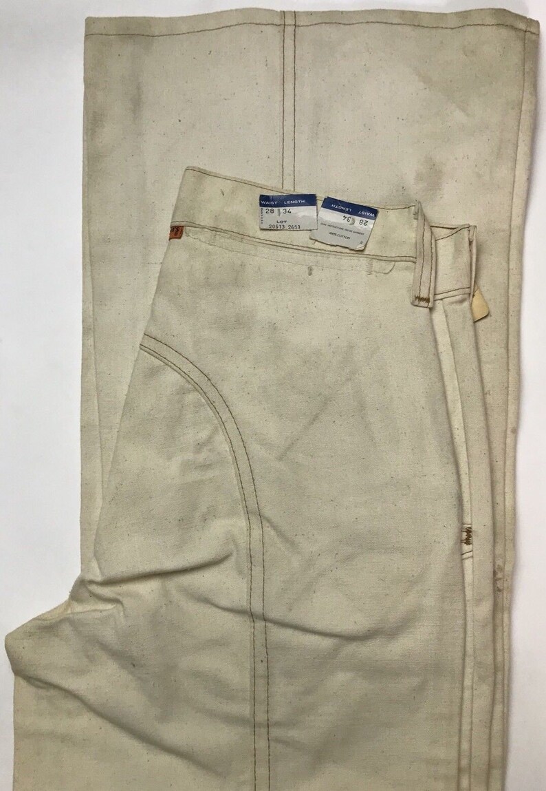 cream levis jeans