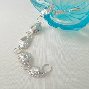 Bespoke solid silver Cornish  limpet seashell linked  bracelet, Handcast in recycled fine silver , Cornish recycled silver limpet bracelet.