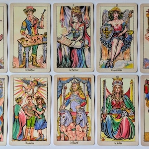 May include: A set of ten tarot cards arranged in two rows, featuring colorful, hand-drawn illustrations of figures like The Fool, The Magician, The High Priestess, The Empress, The Emperor, The Hierophant, The Lovers, The Chariot, Justice, and The Hermit.