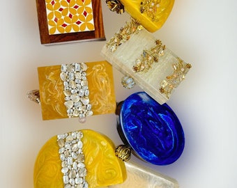 fancy clutch bags. Marble and wooden bags. gifting assesories. Limited eddition purse.