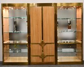 Mastercraft Three Piece Brass and Walnut Hollywood Regency Vitrines Display Cabinets with Interior Downlighting, 1970s