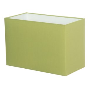 May include: A rectangular green lampshade made of fabric.