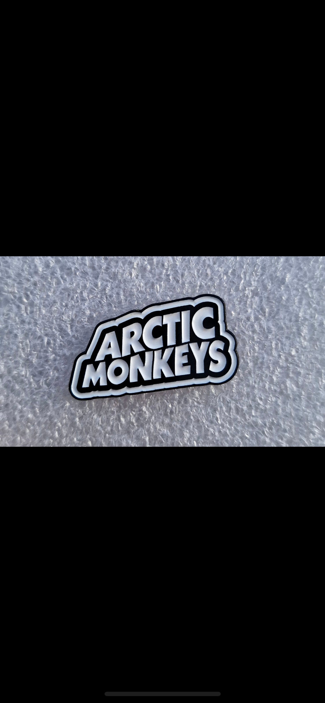 Arctic Monkeys Logo Wallpaper