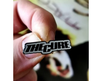 The Cure pin badge Gothic  Rock Post Punk Faith. Approx 27mm Wide with Butterfly Clutch Attachment.