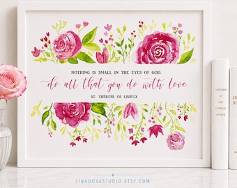 May include: A framed print featuring watercolor pink roses and green foliage with the text: NOTHING IS SMALL IN THE EYES OF GOD. do all that you do with love. ST. THÉRÈSE OF LISIEUX. The design is centered with floral borders at the top and bottom.