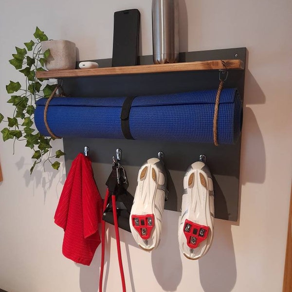 Peloton equipment and yoga mat storage. Perfect for 2 people with 4 hooks, shelf and yoga mat hanging. Handmade in wood.