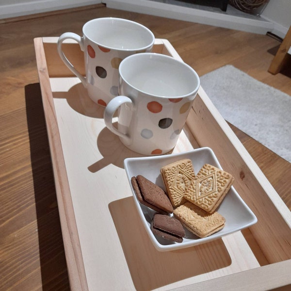 Handmade rustic wooden servinng tray with iron black or bronze half moon cup handles. Finished with a light oak stain.