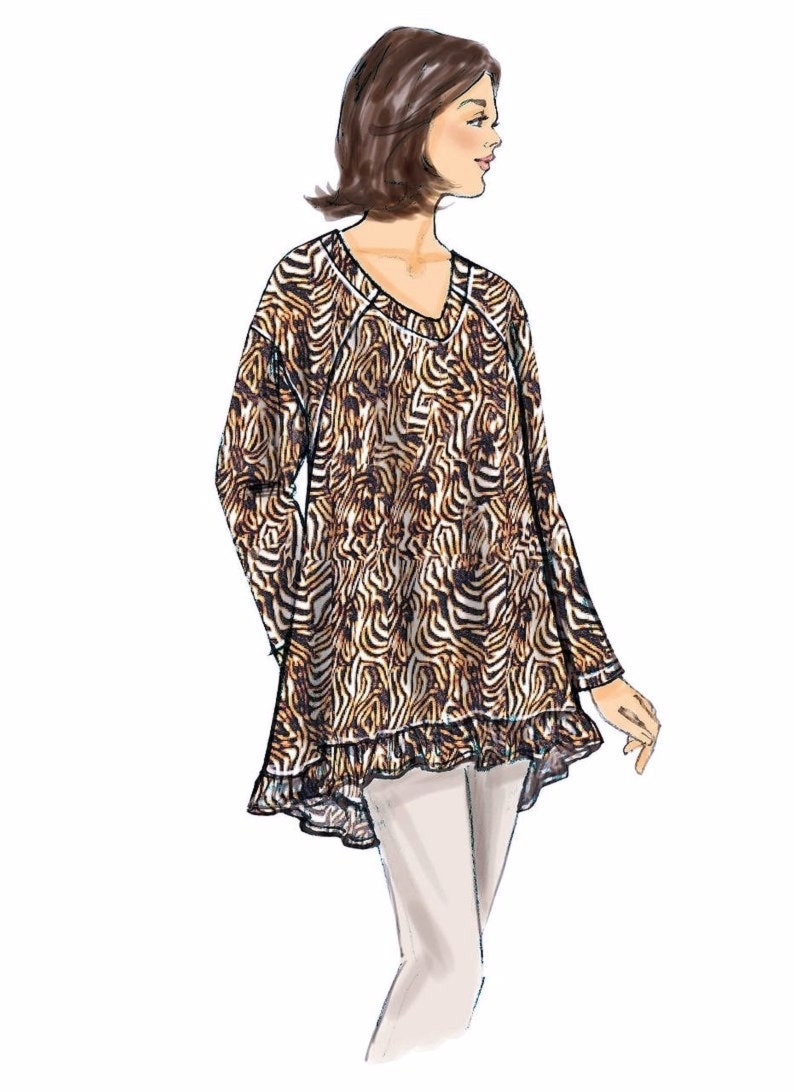 May include: A long-sleeved, animal print top with a ruffled hem. The top has a V-neck and is a loose fit.