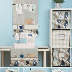 May include: A sewing room organization project with a sewing machine, a fabric storage shelf, and a variety of fabric storage containers. The containers are labeled "Fabrics", "Patterns", and "Notions".